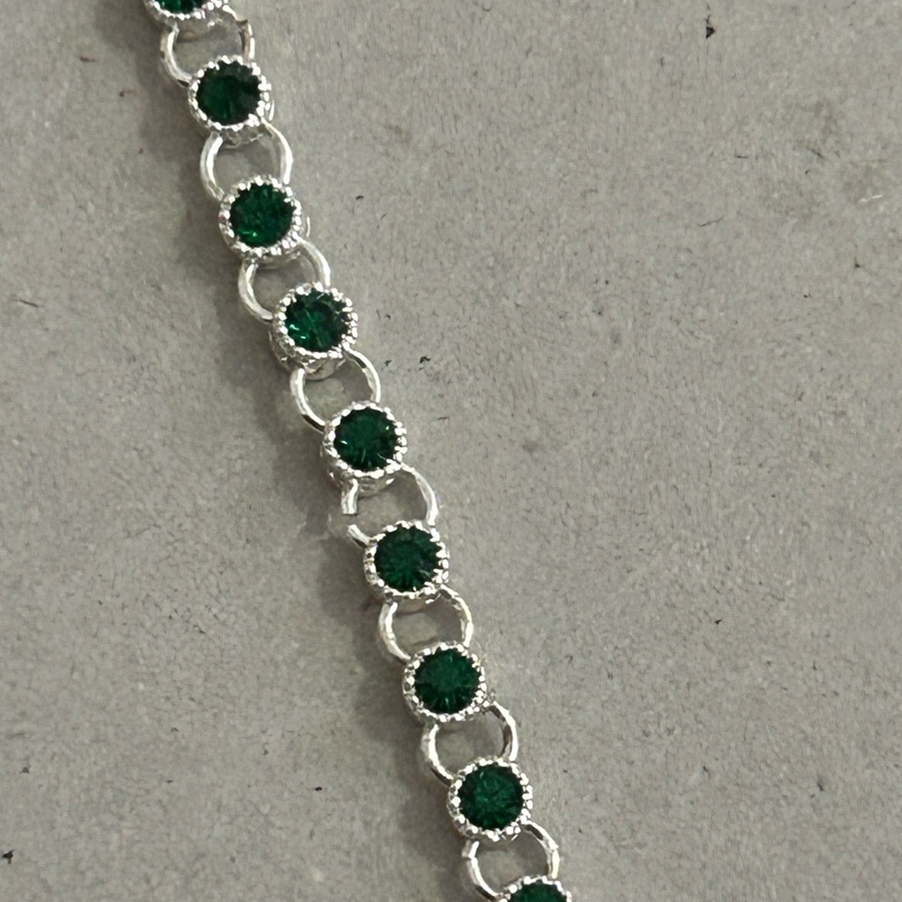 Women’s vintage Avon bracelet. Silver tone with beautiful green gemstones